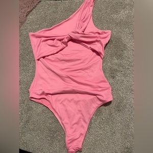 pink body suit